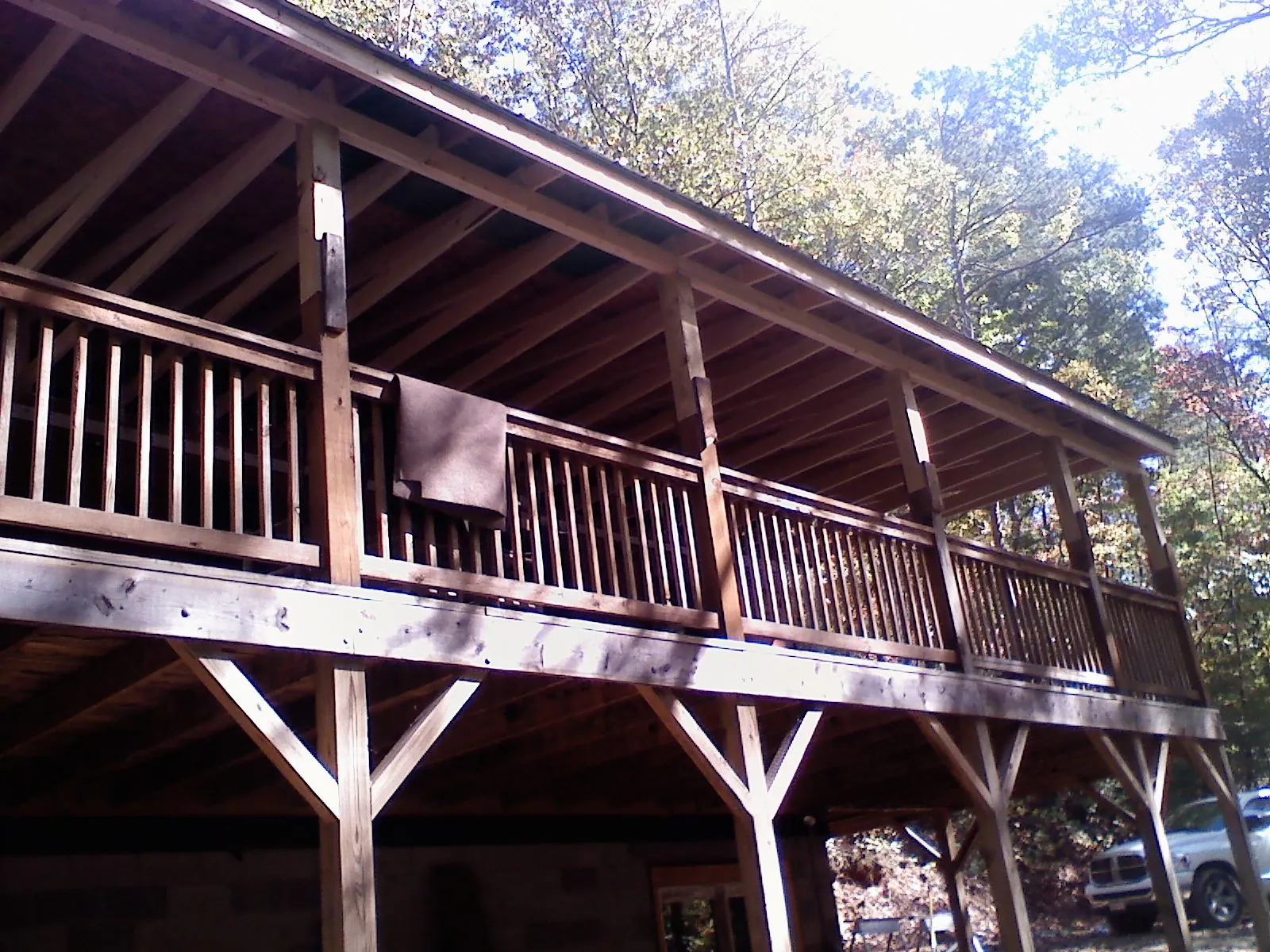 Timber framing under a new elevated porch and deck — Roof Leak Repair in Colt by Roofing Brothers